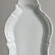 white porcelain plate in an unusual shape