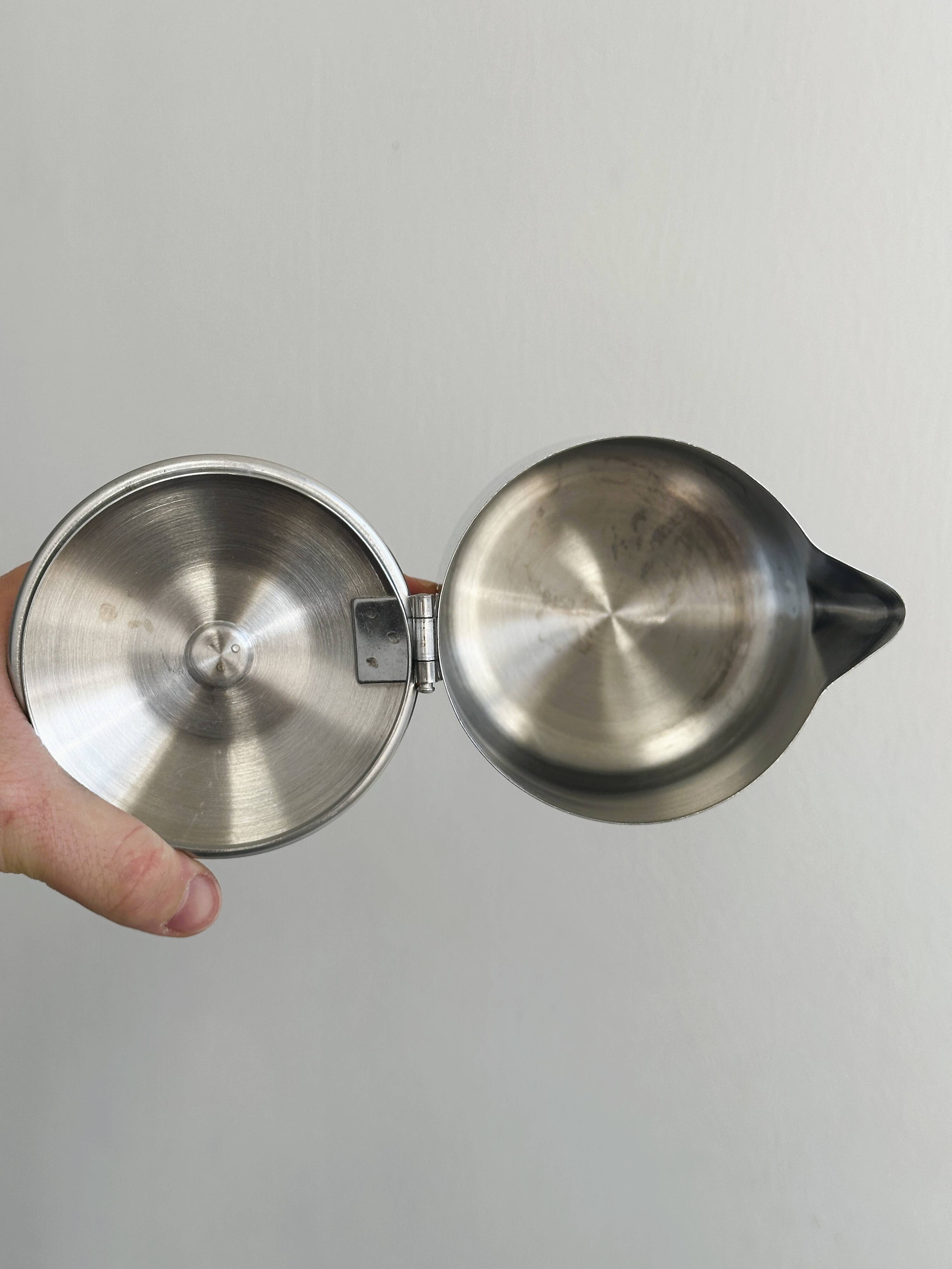 Milk jug, carafe in shiny stainless steel