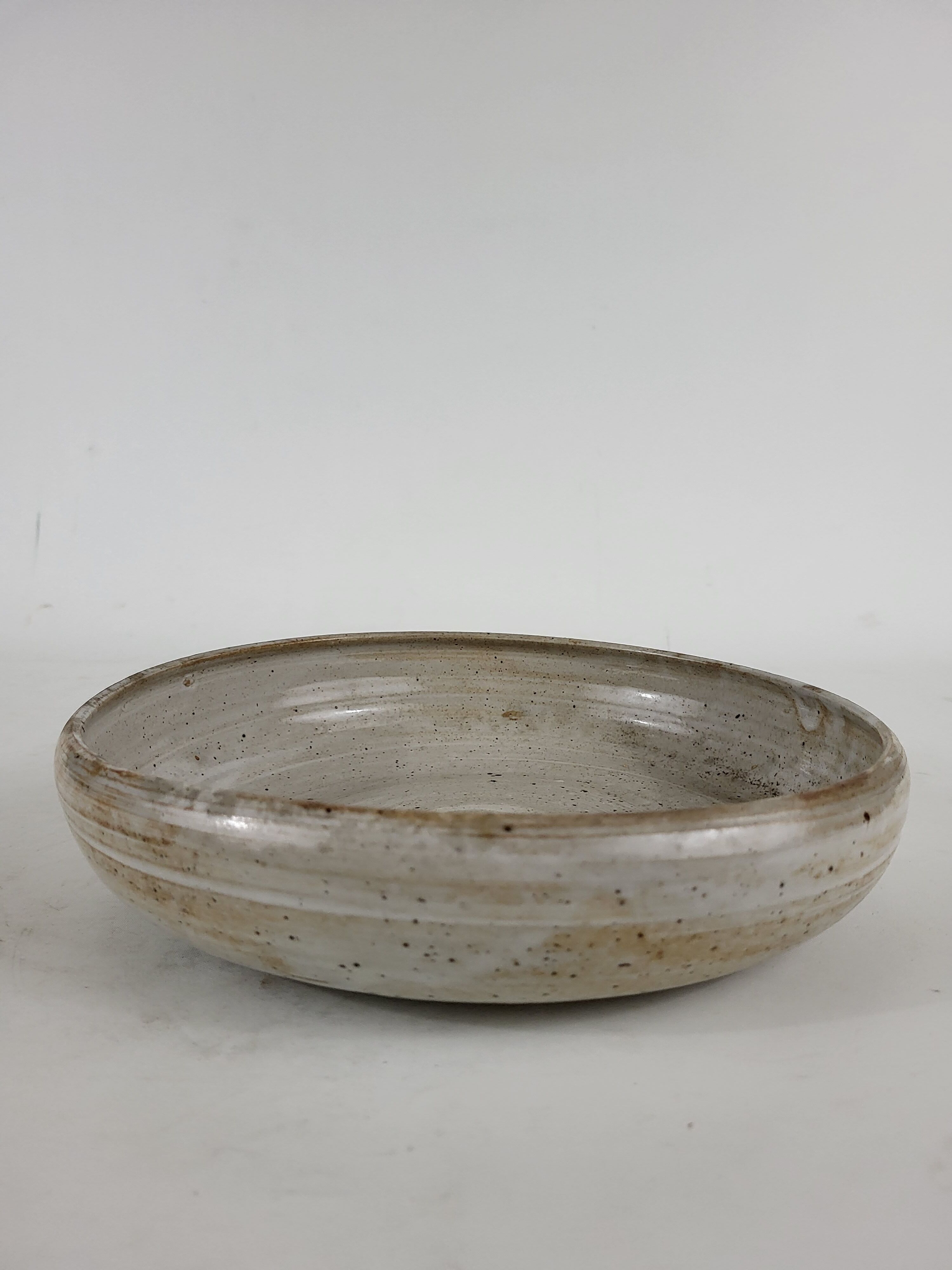 Hollow stoneware dish signed Pierre lion Puisaye