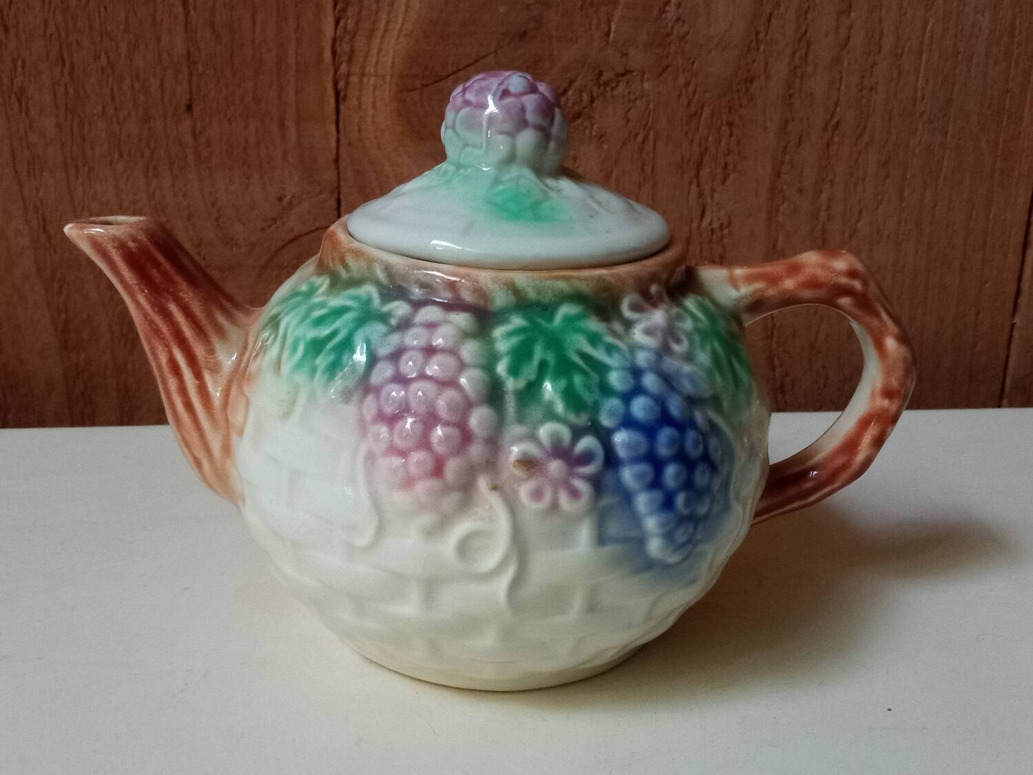 Antique teapot in slip