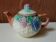 Antique teapot in slip