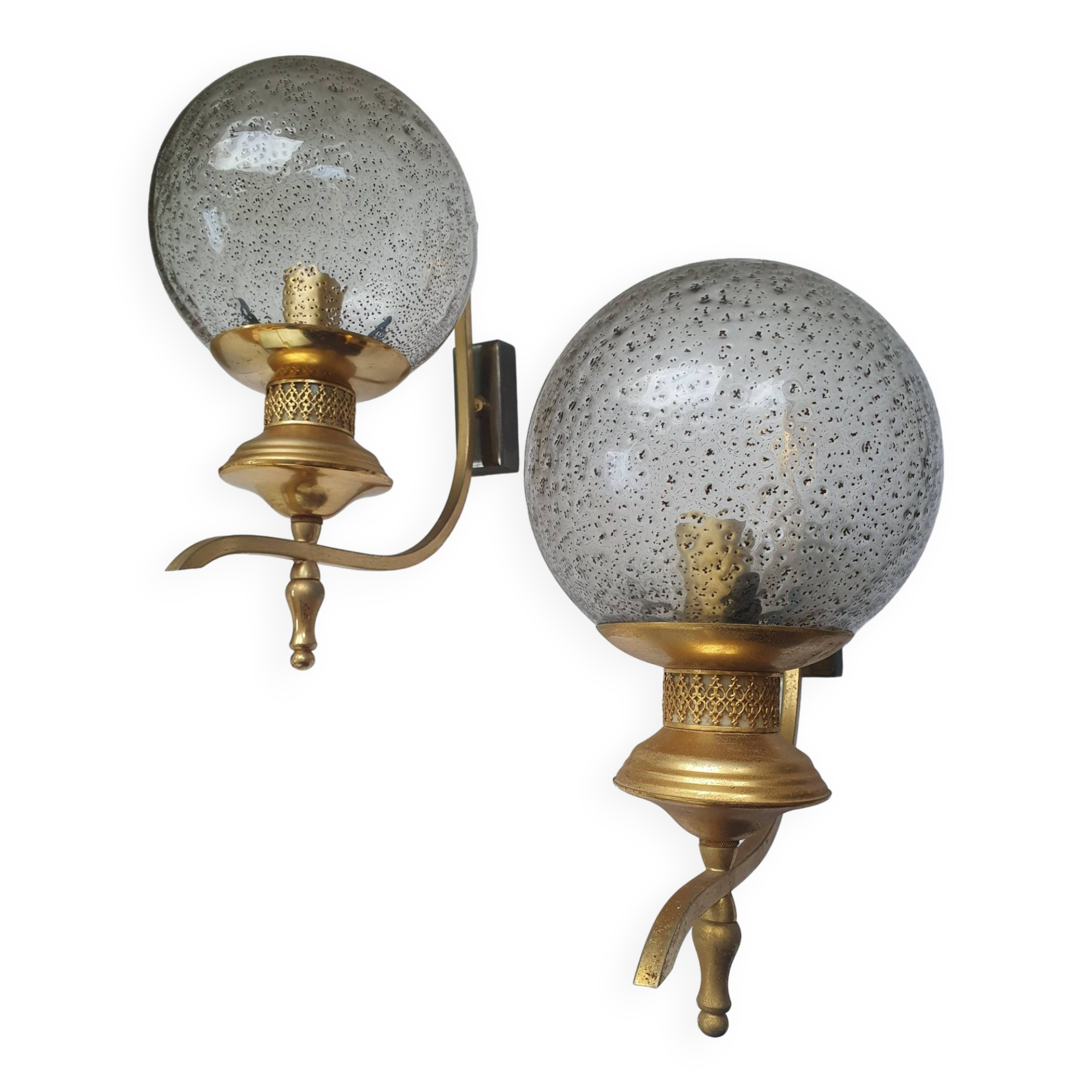 Pair of vintage gold wall sconces with transparent globes