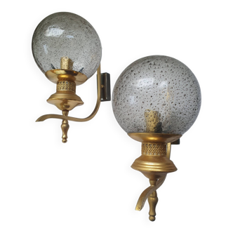 Pair of vintage gold wall lights with transparent globes