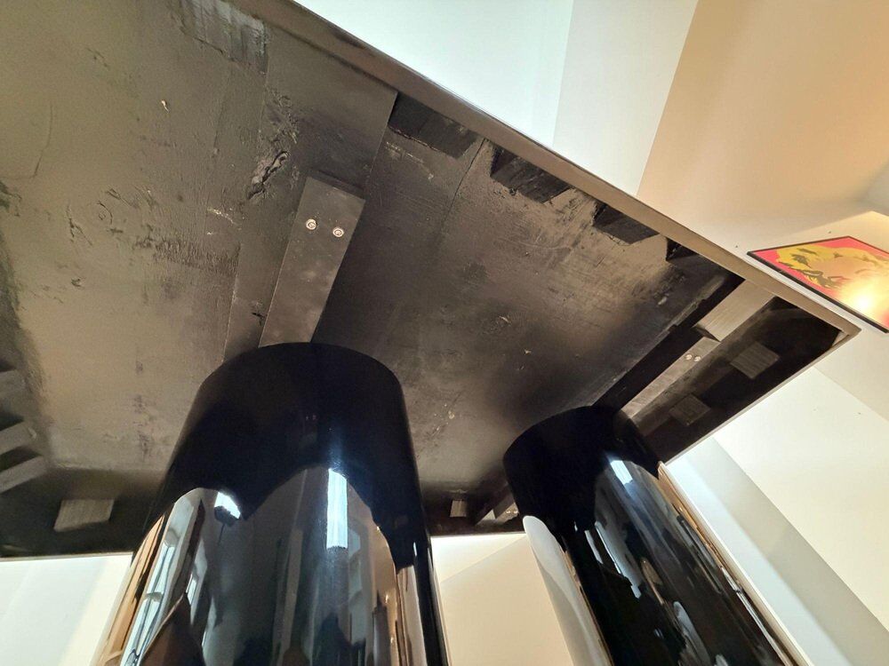 Art Deco dining table in black piano lacquer & metal, 1930