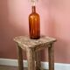 Amber glass bottle vase