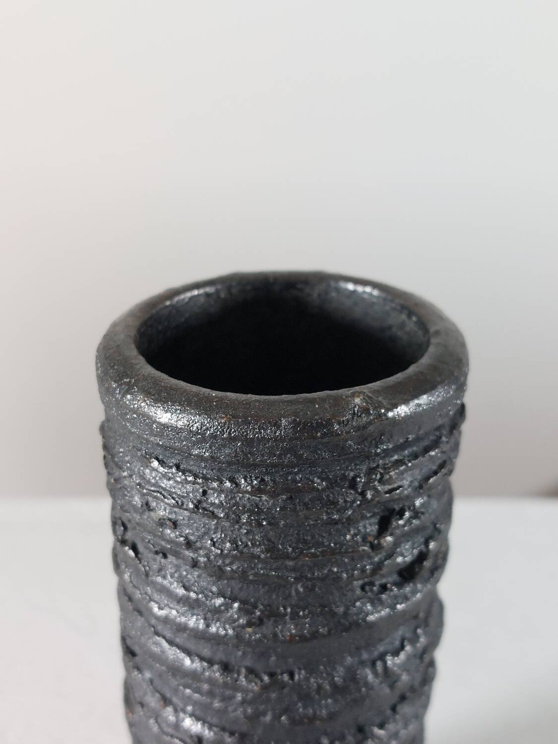 Small vintage brutalist vase with oxidised glaze from the 1950s.