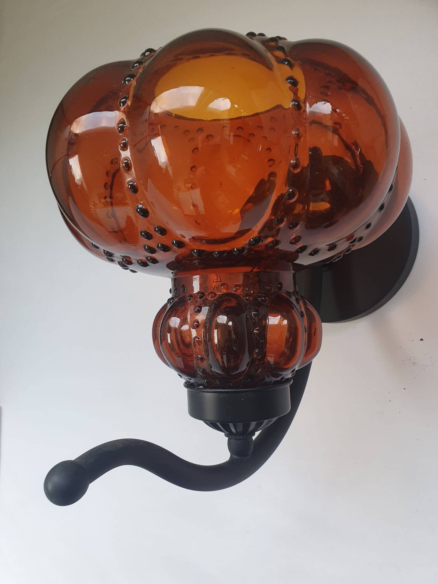 Three large vintage brown glass wall lights