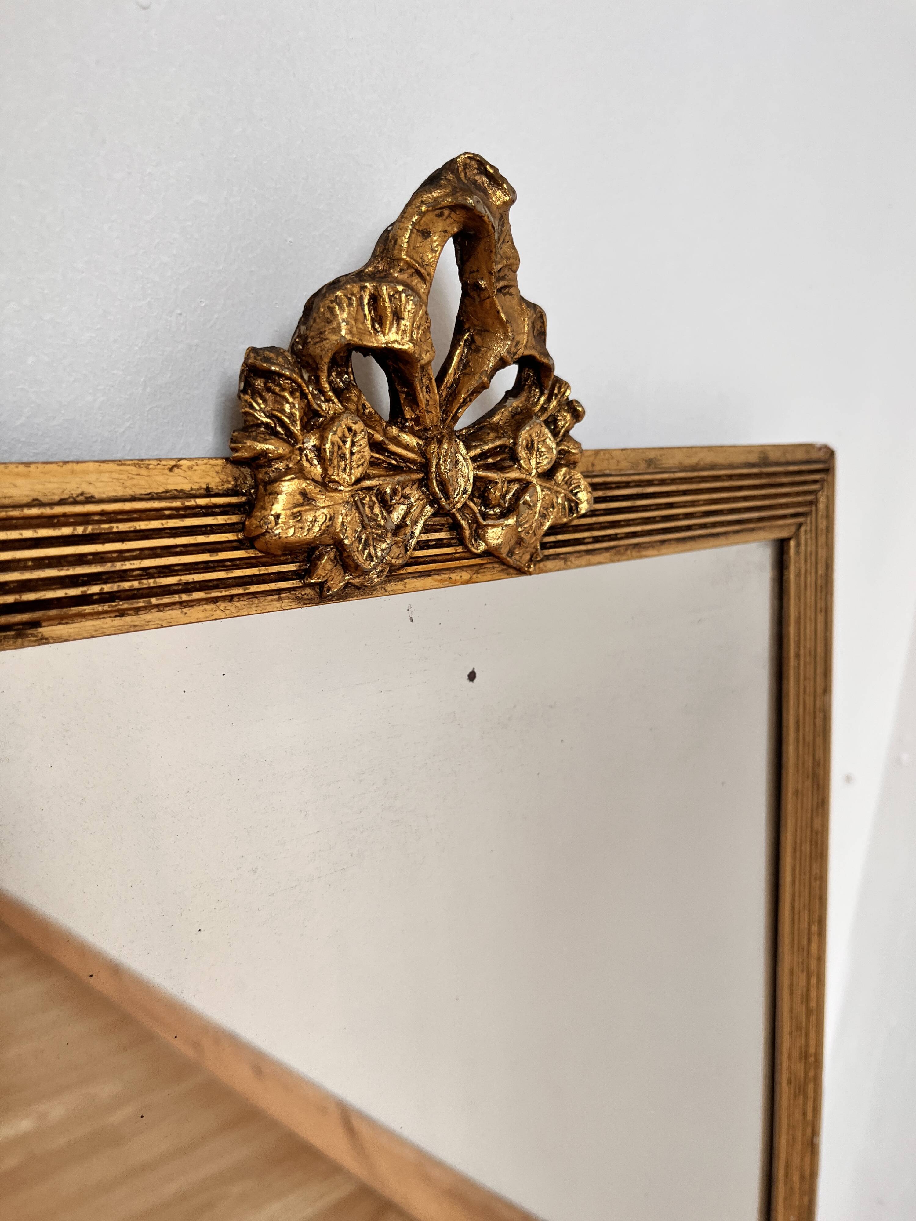 Golden mirror in Louis XVI style