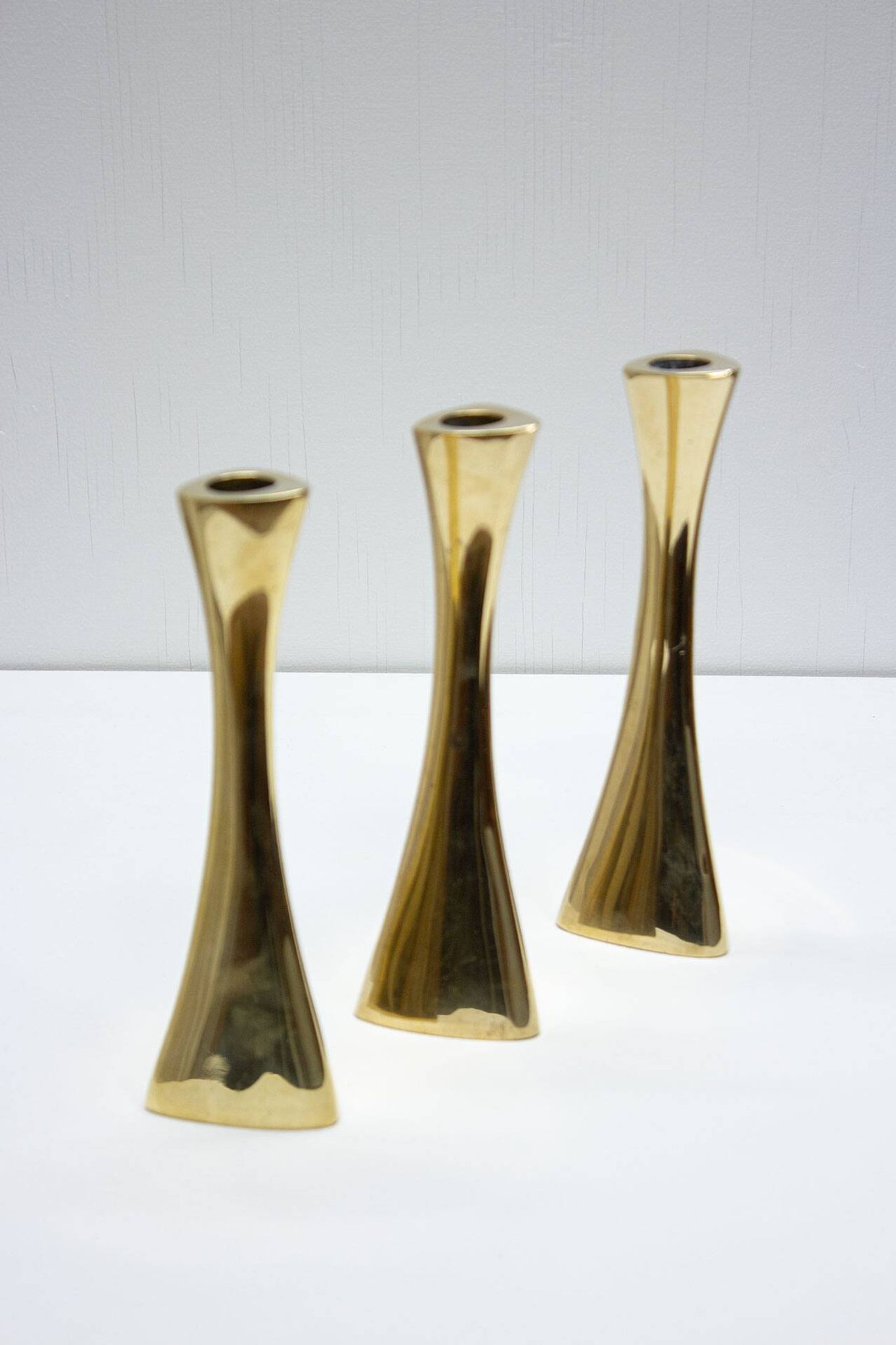 Set of 3 organic shaped brass candlesticks by K.E. Ytterberg, Sweden