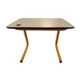 Yellow tubular desk and chair from the 1970s.