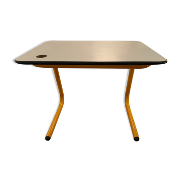 Yellow tubular desk and chair from the 1970s.