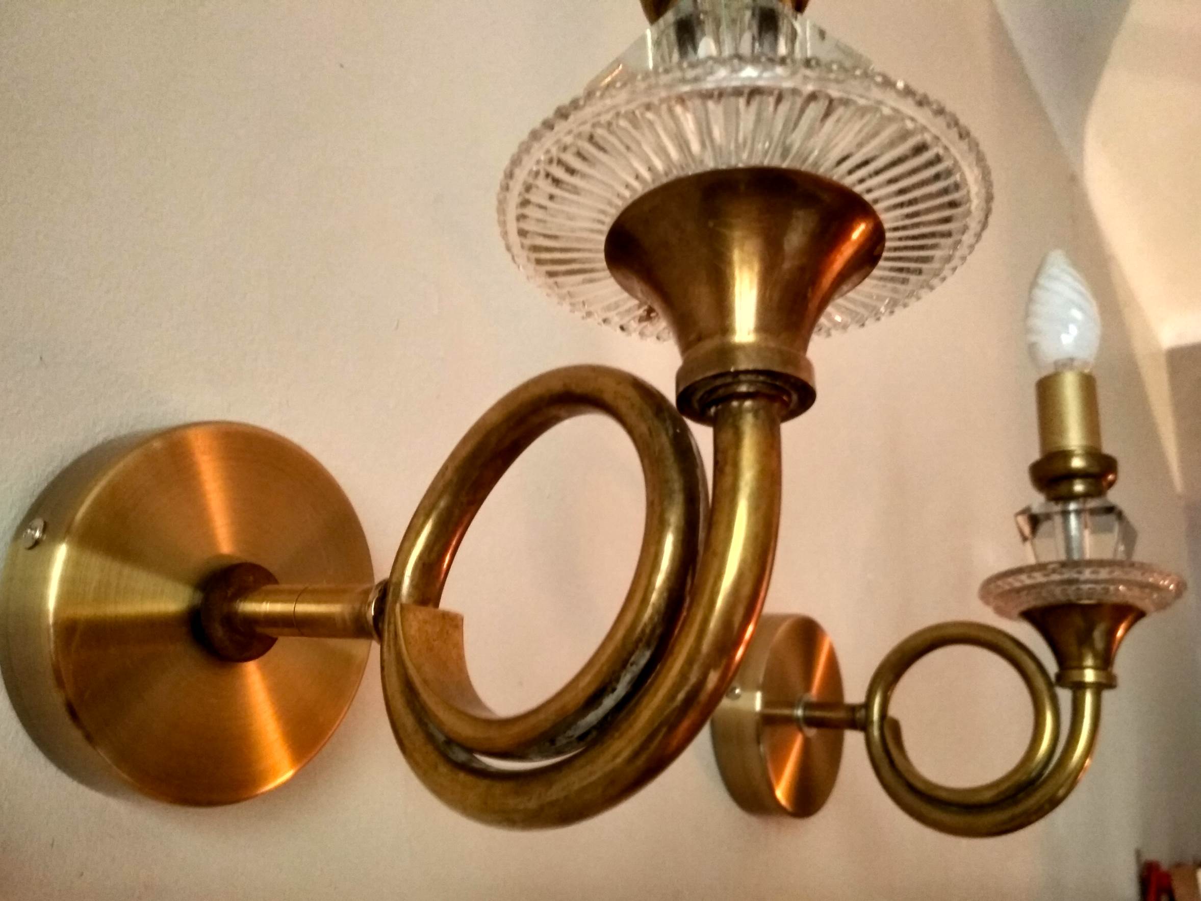 Pair of old brass wall sconces