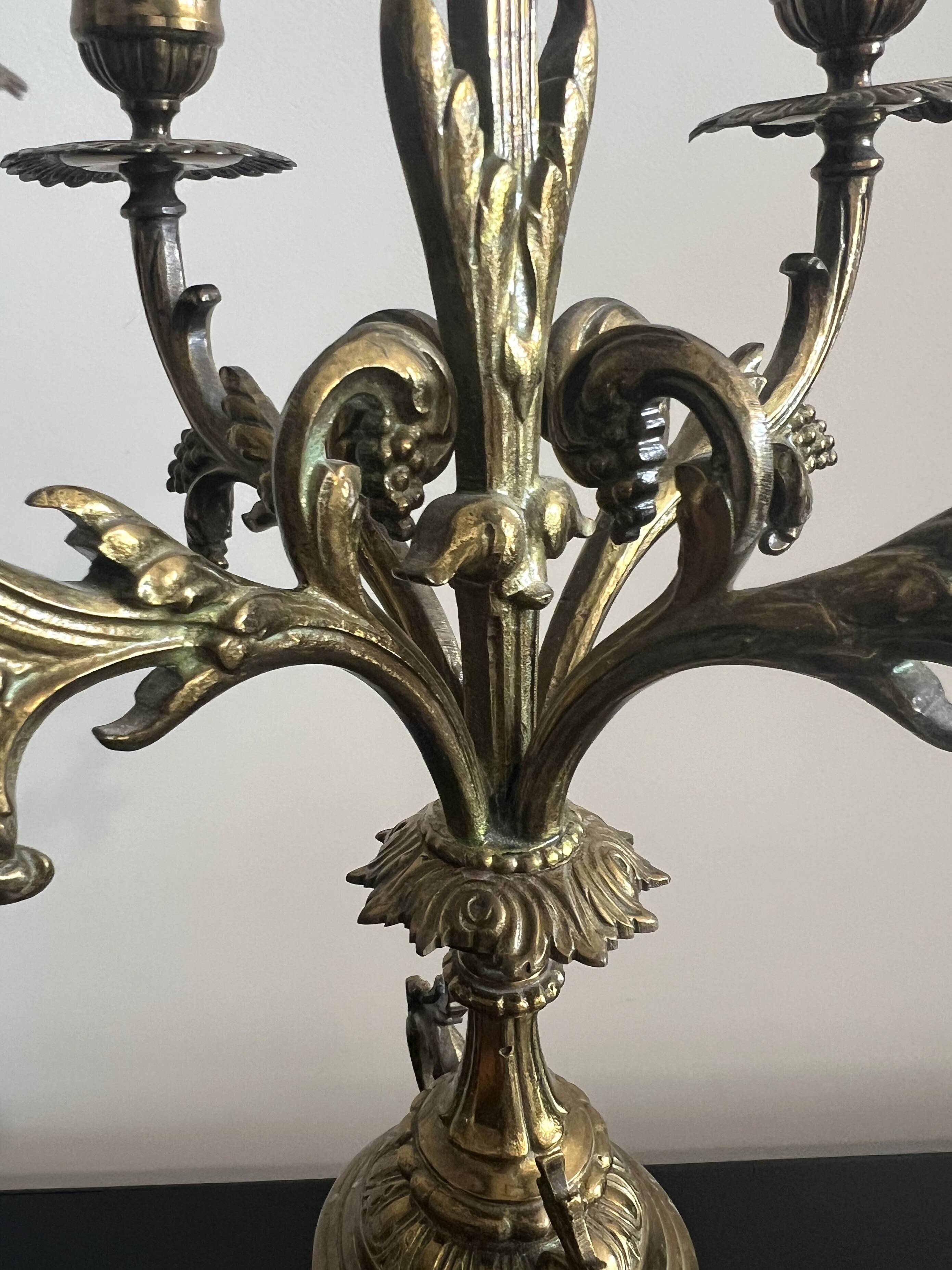 Pair of five-light gilded bronze candelabras, Napoleon III, 19th century.