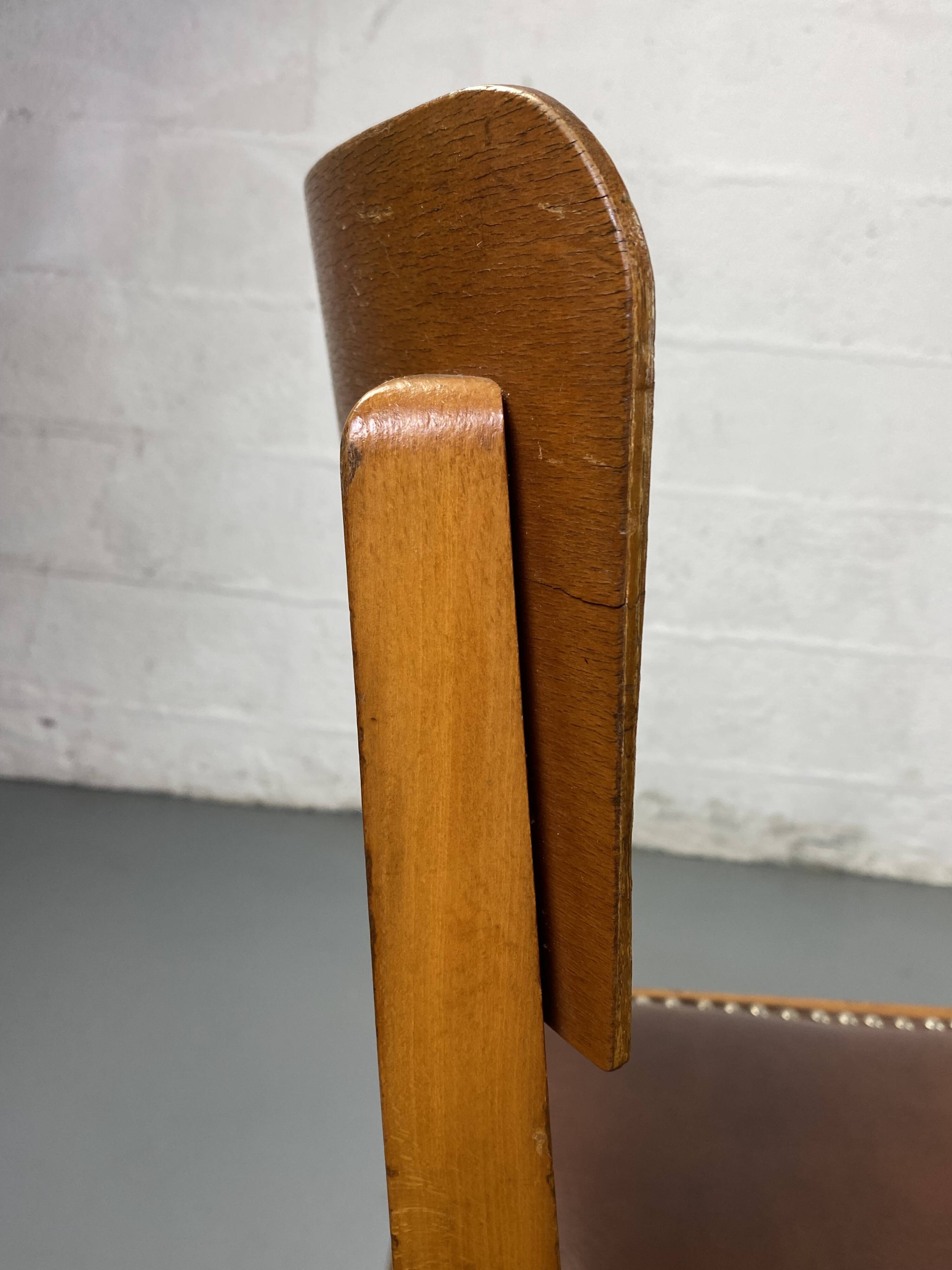 Pair of wooden and leather chairs