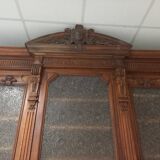 Glass-fronted walnut bookcase