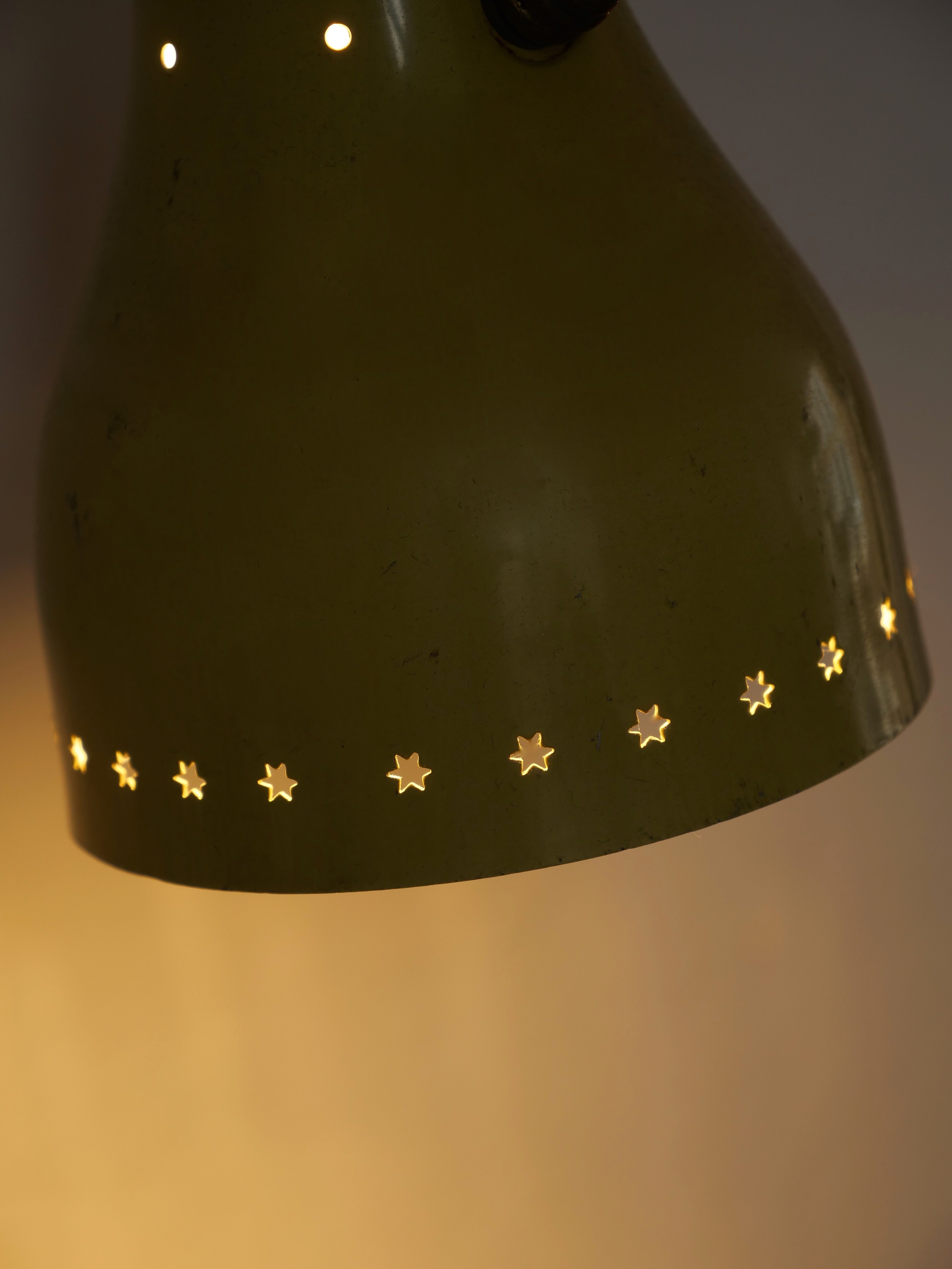 Wall lamp inlaiton and pale yellow lacquered metal