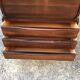 Vintage Scandinavian secretary in rosewood with drawers featuring fin-style handles.