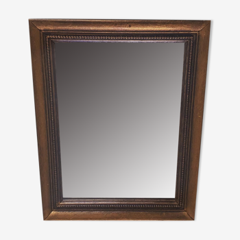 Miroir doré en bois