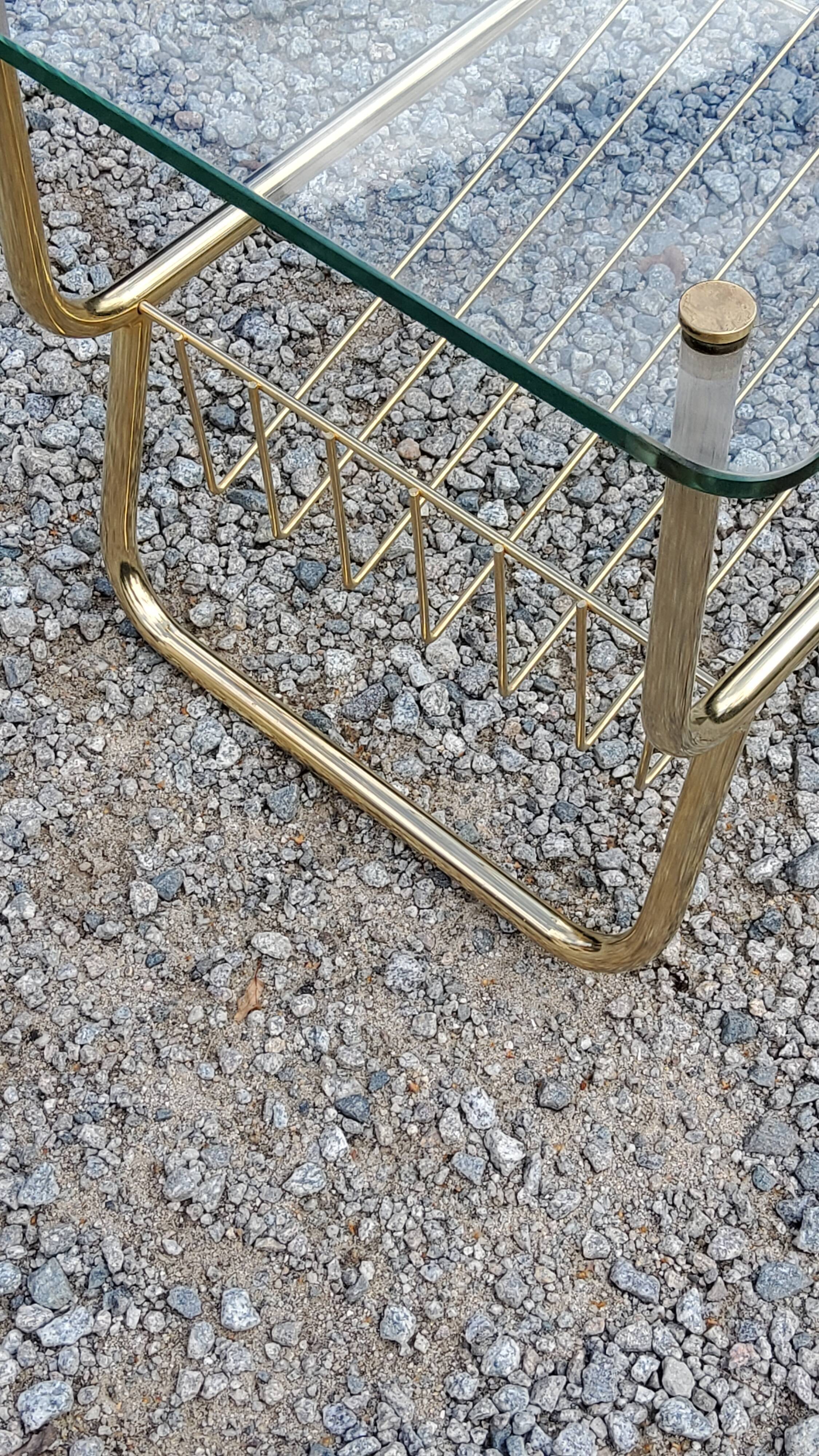 Coffee table from the 60s top glass base metal gilded