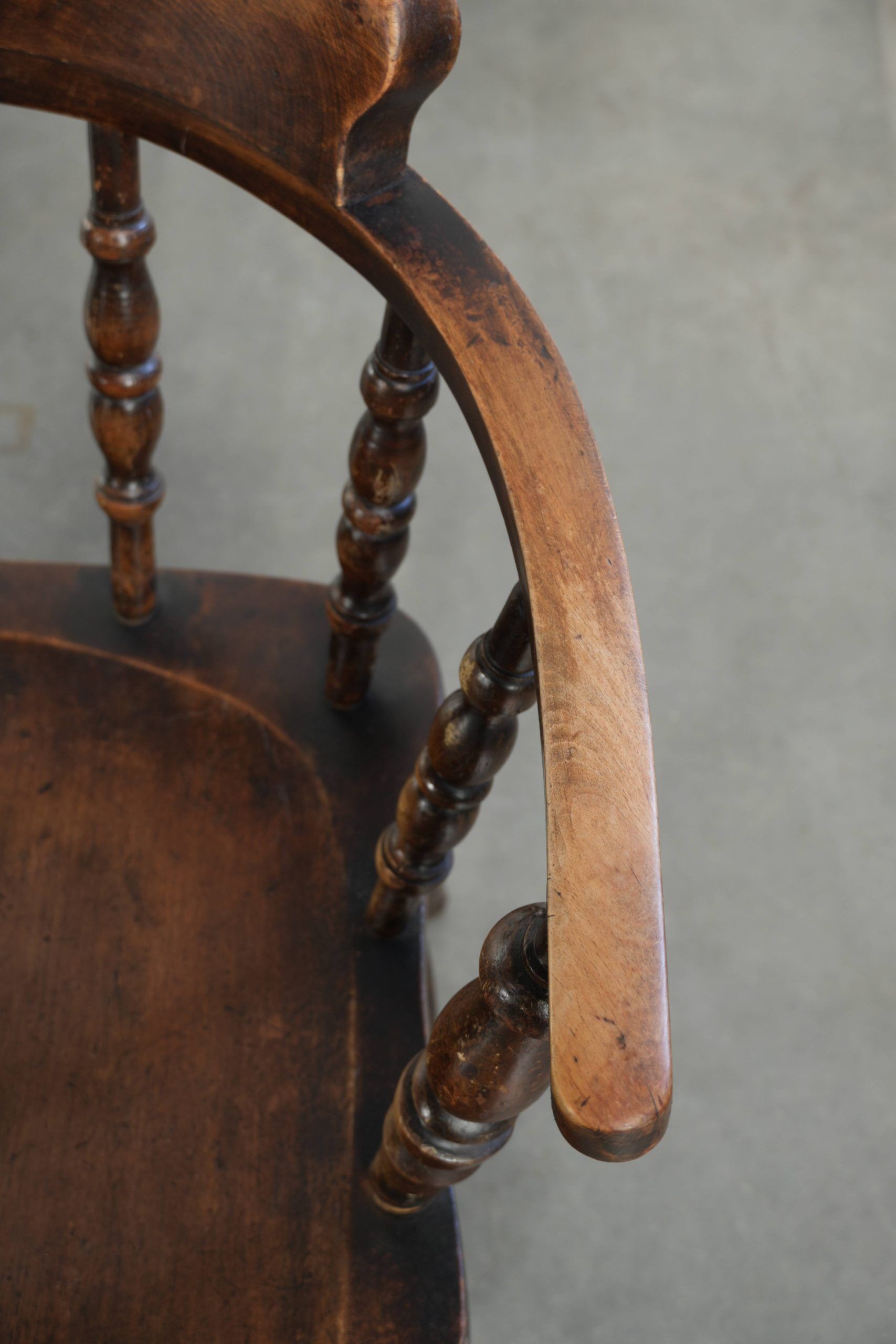 Set of four wooden English antique pub/captain chairs from the 19th century