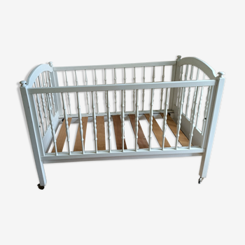White-bar baby cot