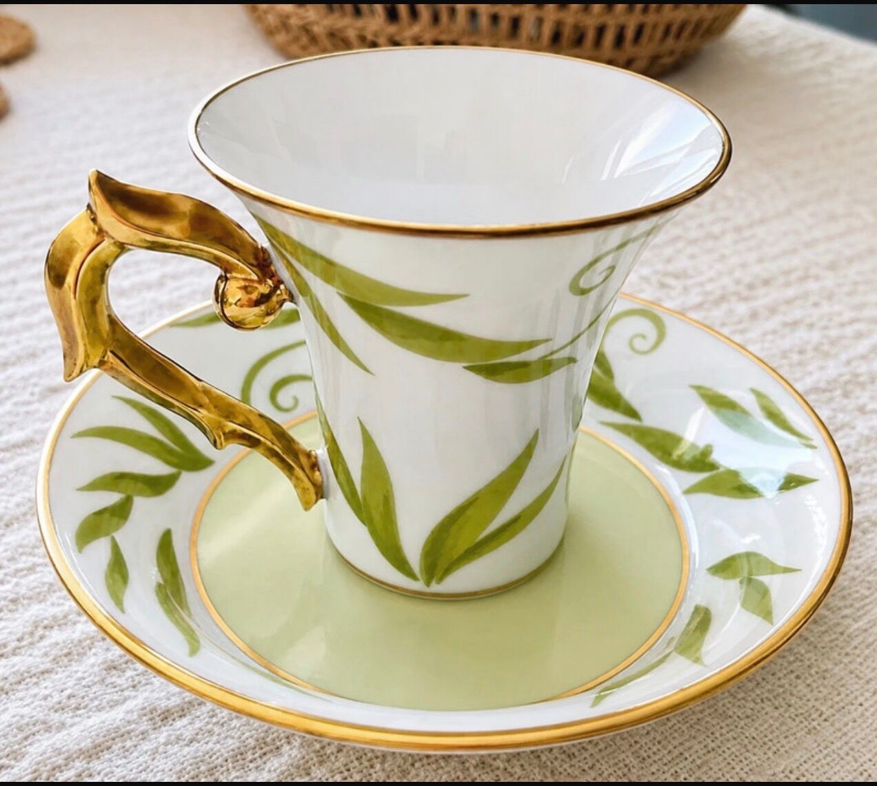 Bernardaud coffee/tea cup with saucer from the Frivole collection.