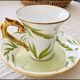 Bernardaud coffee/tea cup with saucer from the Frivole collection.