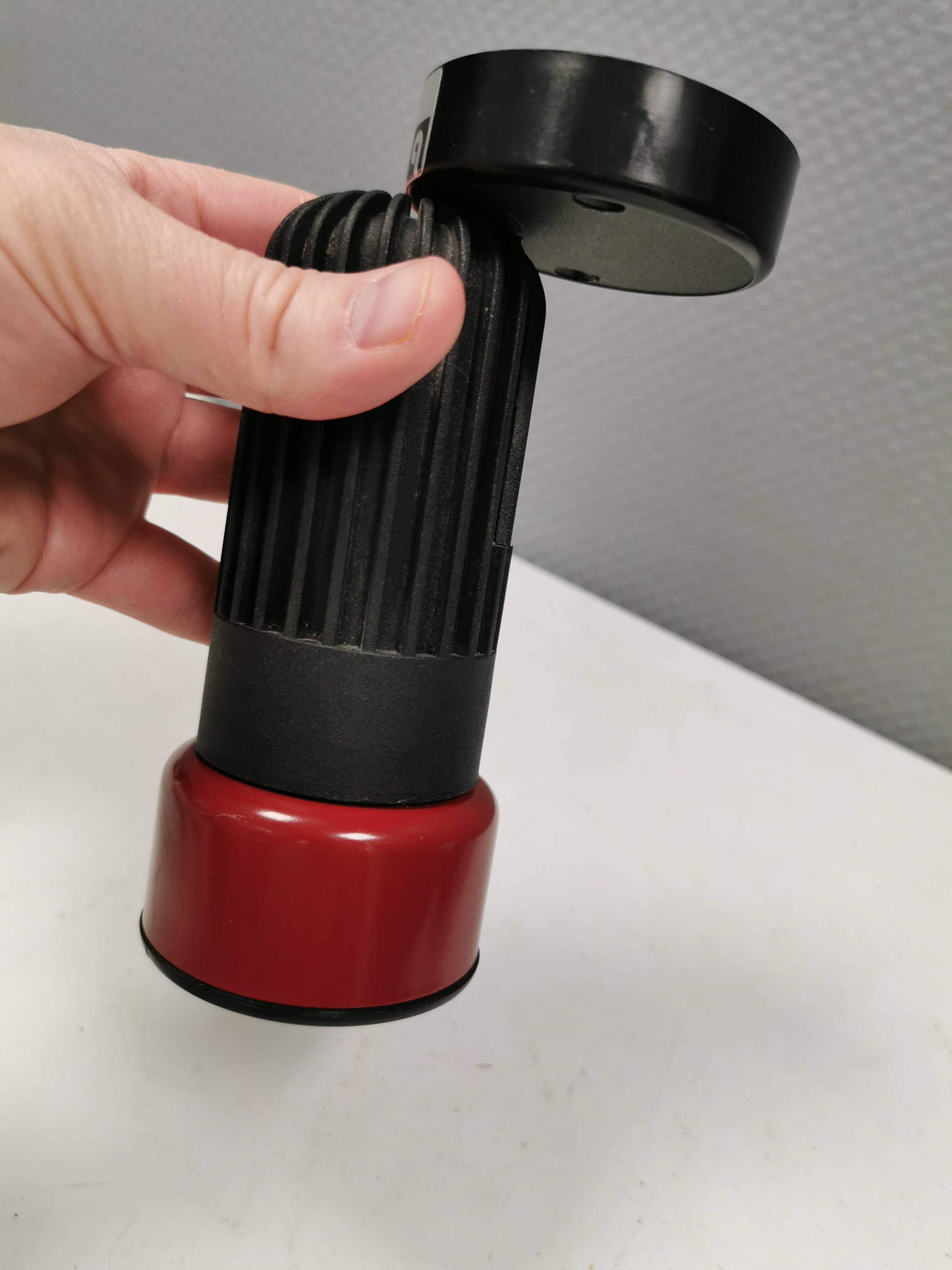 Small vintage wall lamp in hard pressed black and red plastic