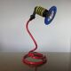Spiral lamp in primary colours from the 80s Memphis era.