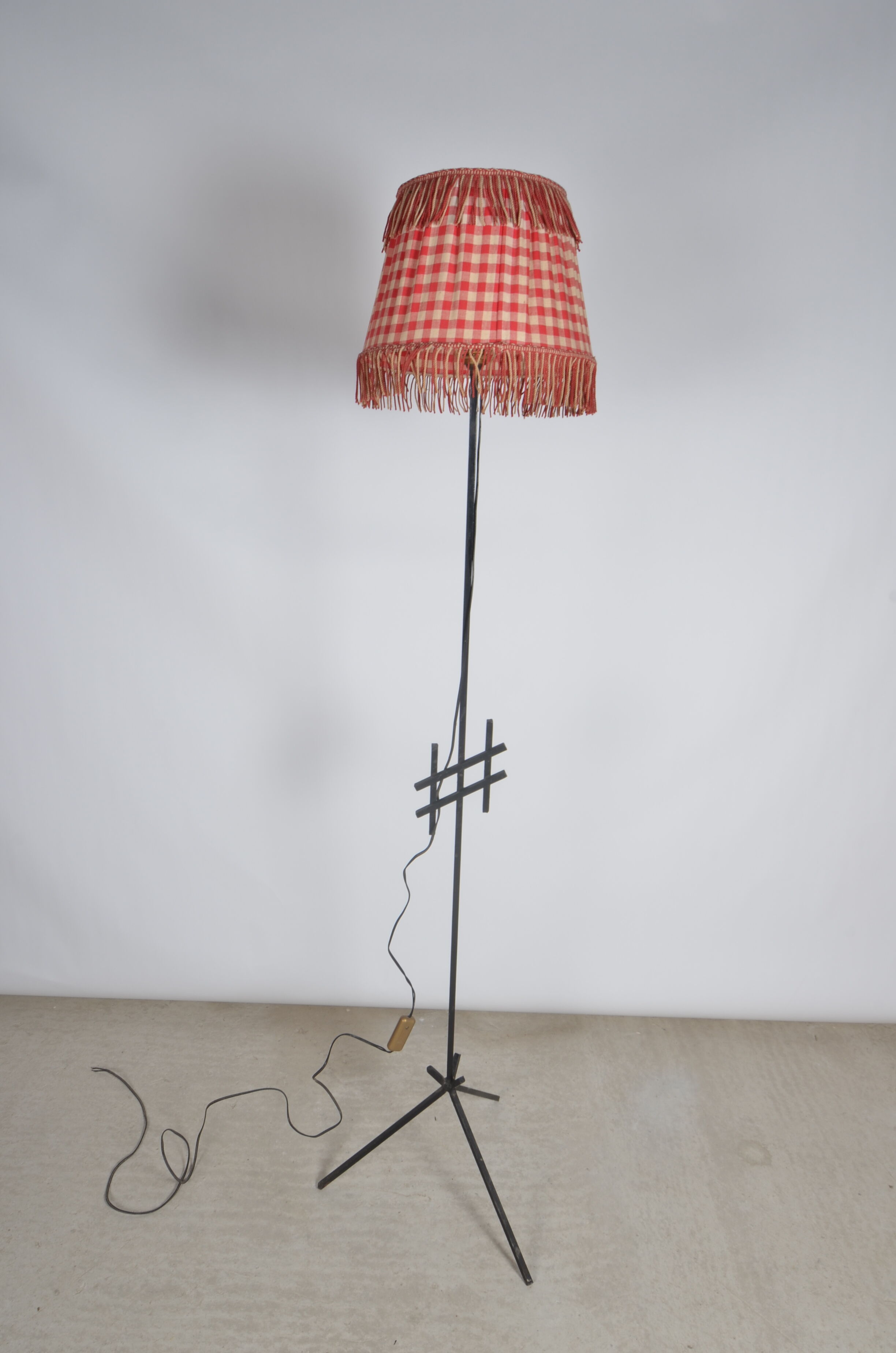 Modernist Tripod floor lamp.