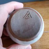 Covered pot in Poncé sandstone signed