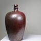 Large stoneware jar from Normandy with lustrous burgundy glaze, from the 1920s-30s.