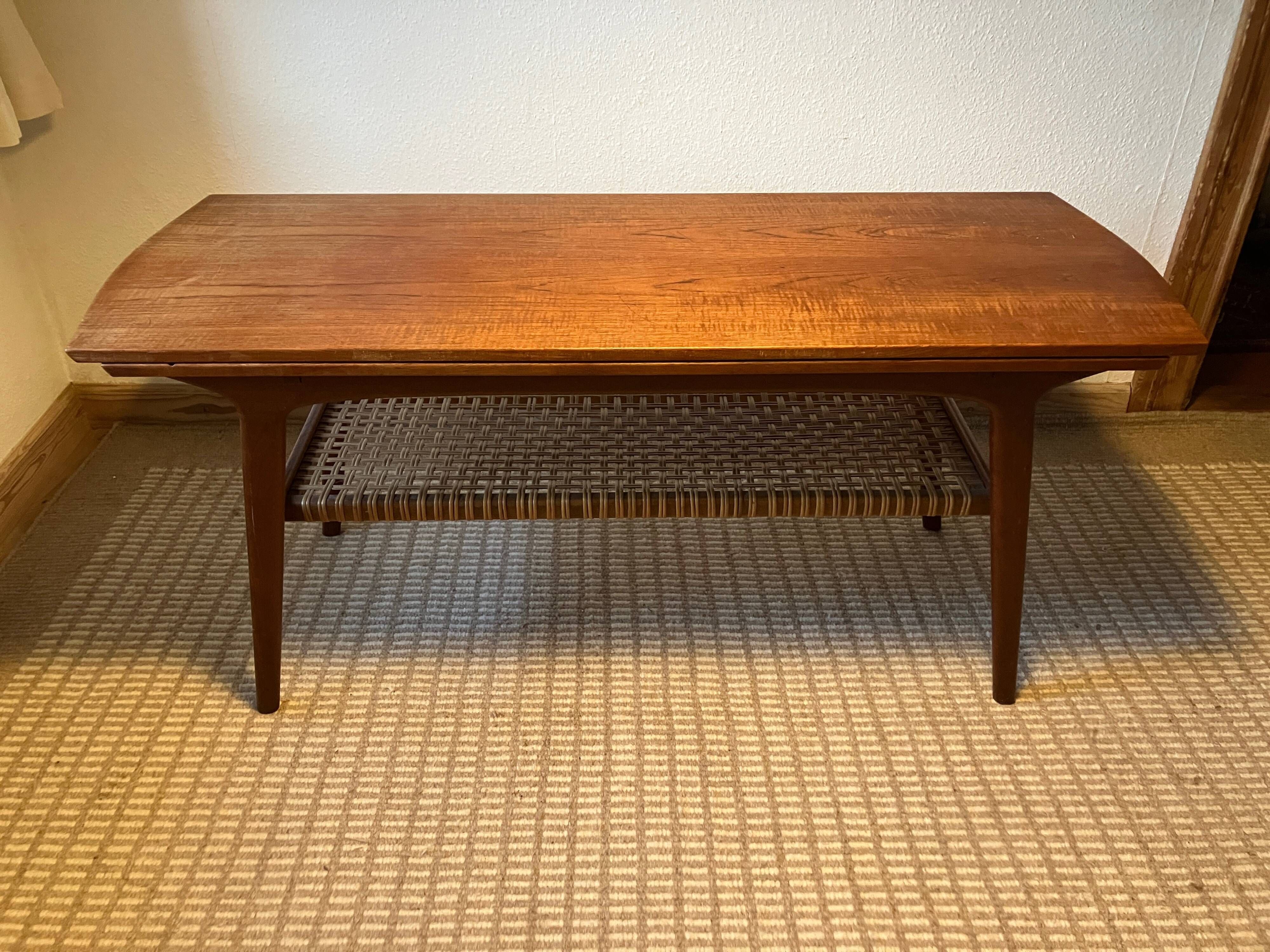 Danish coffee table from the 1960s, in good original condition, teak wood, rattan. by HELTBORG MOBLER