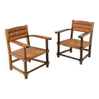 Pair of French armchairs with twisted legs in the style of Charles Dudouyt, France, 1940s.