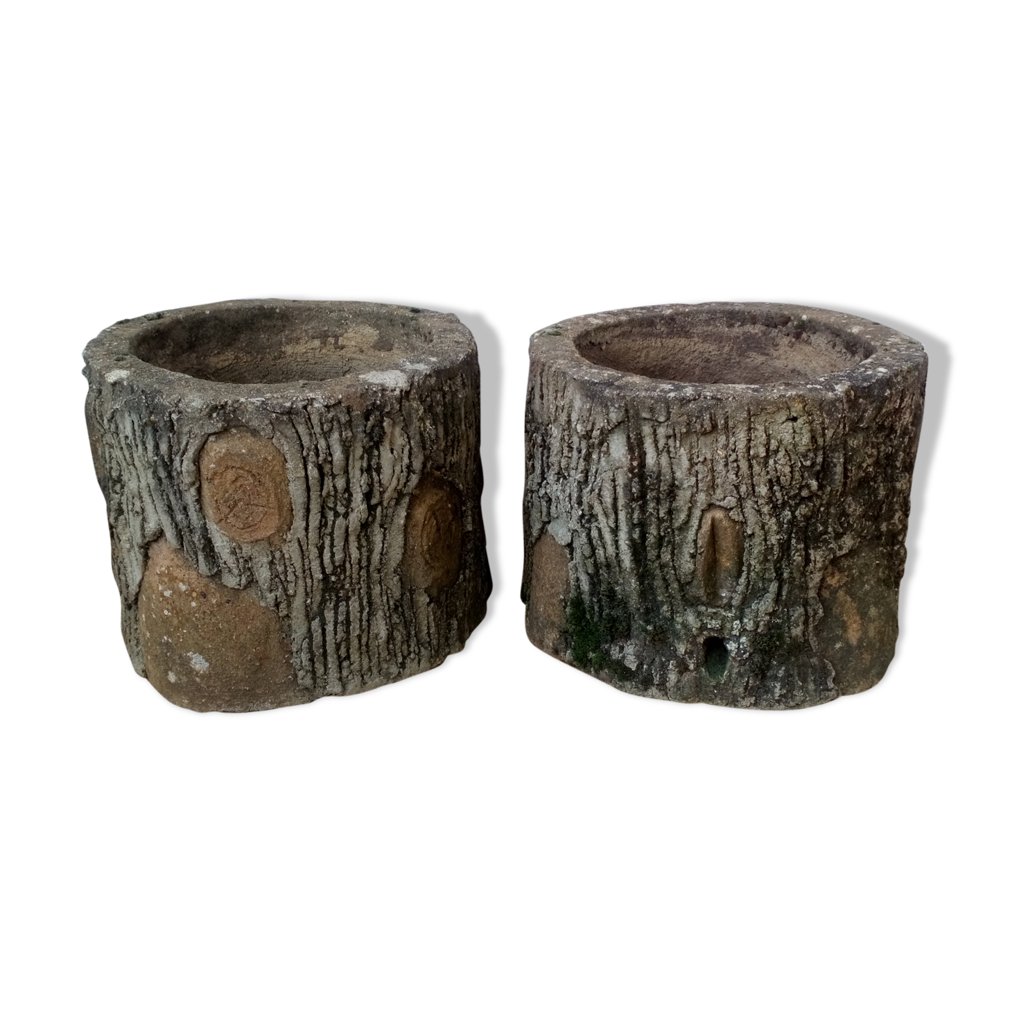 Pair of old rock garden planters in concrete