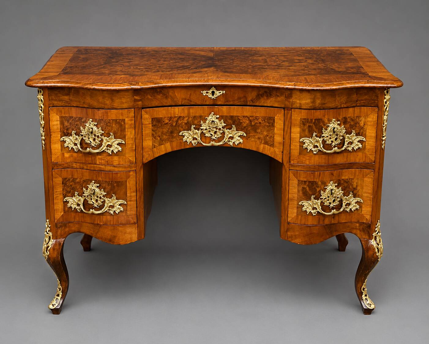 Antique baroque-style desk from Dresden with five drawers.