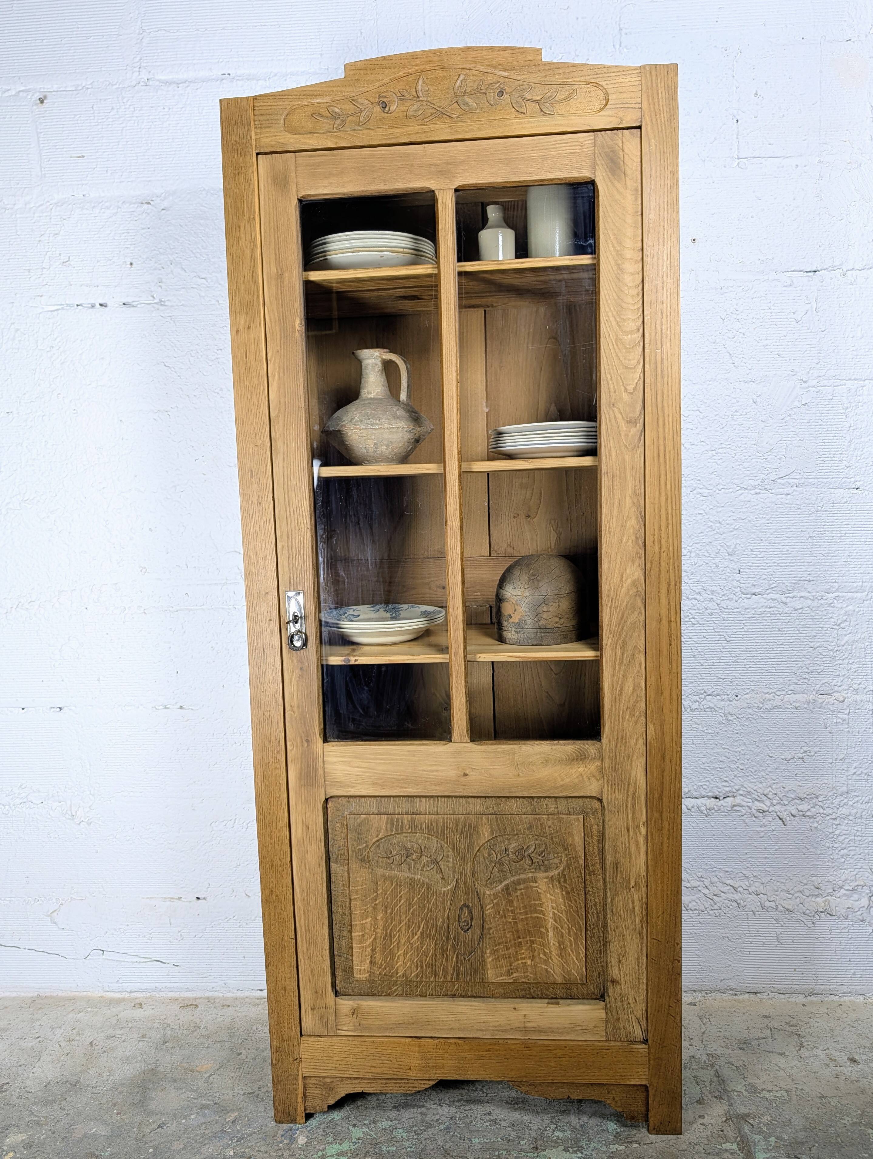 Glass-fronted cabinet from the 1930s-1940s.