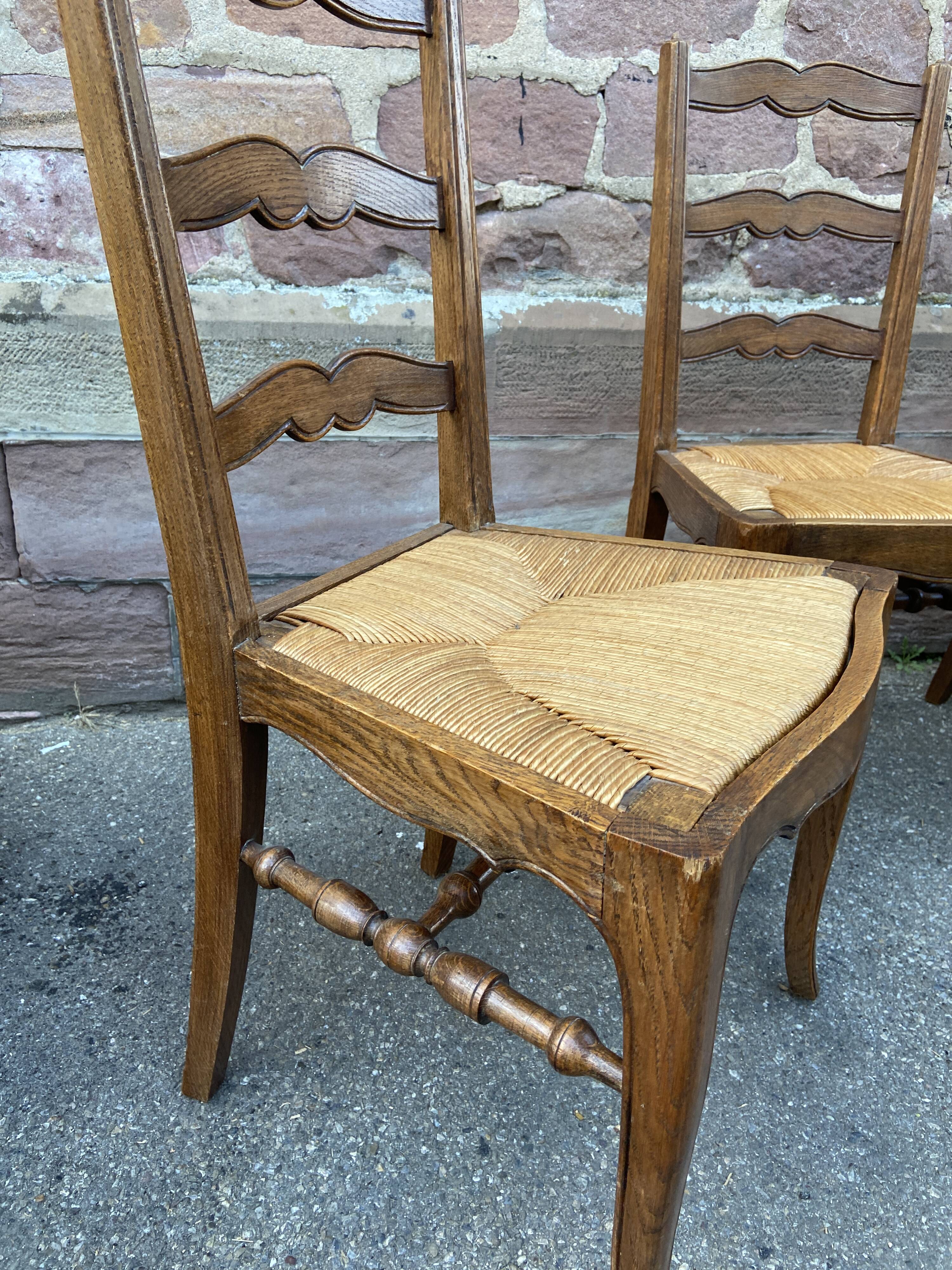8 vintage rustic mulched chairs