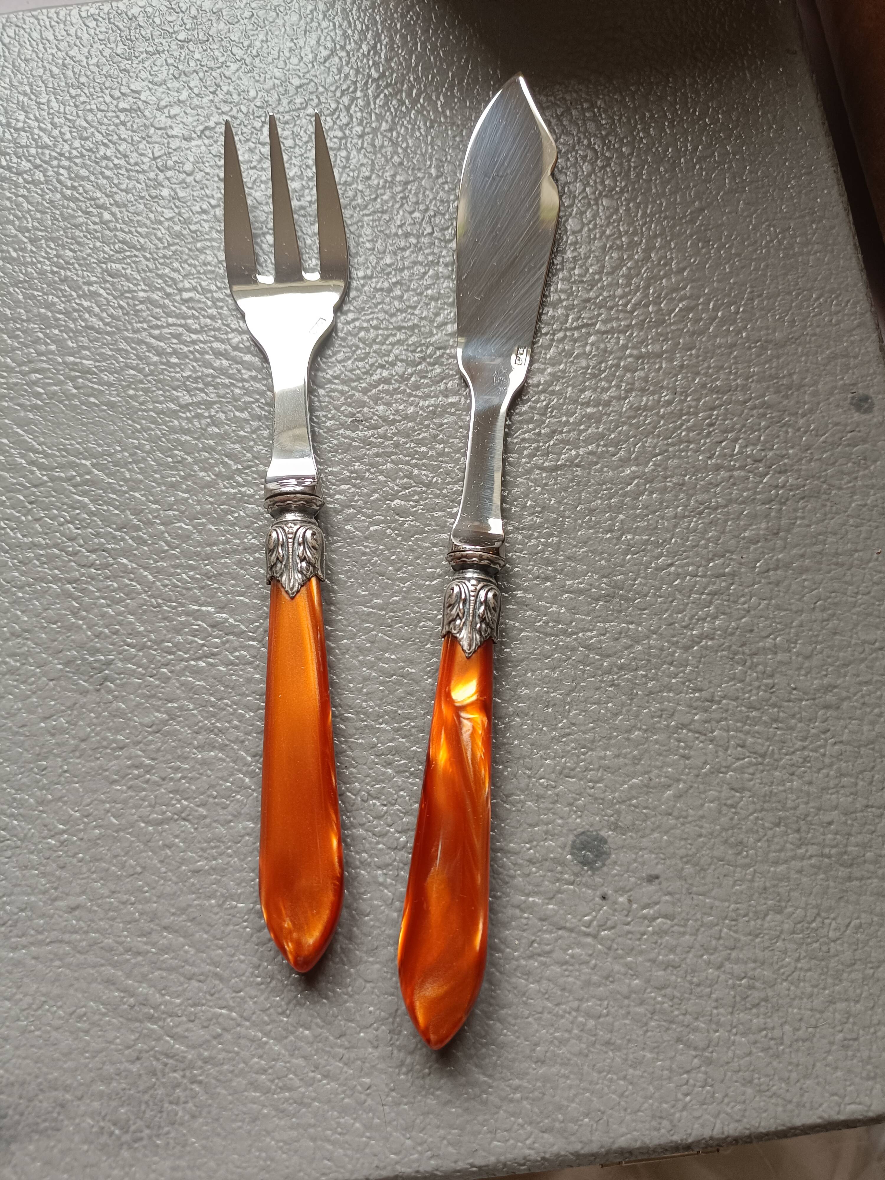 Cutlery Chabanna. Stainless steel and iridescent handle; 24 dessert place settings.