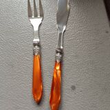 Cutlery Chabanna. Stainless steel and iridescent handle; 24 dessert place settings.