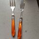 Cutlery Chabanna. Stainless steel and iridescent handle; 24 dessert place settings.