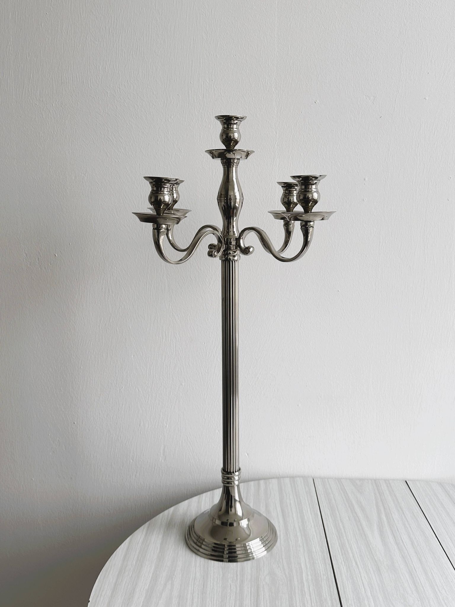 Large 5-arm candlestick in shiny silver metal