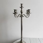 Large 5-arm candlestick in shiny silver metal