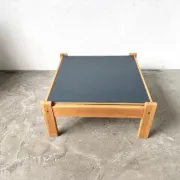 Modernist coffee table in solid pine with a reversible top, 1970s.