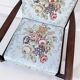 Vintage teak armchair with floral upholstery