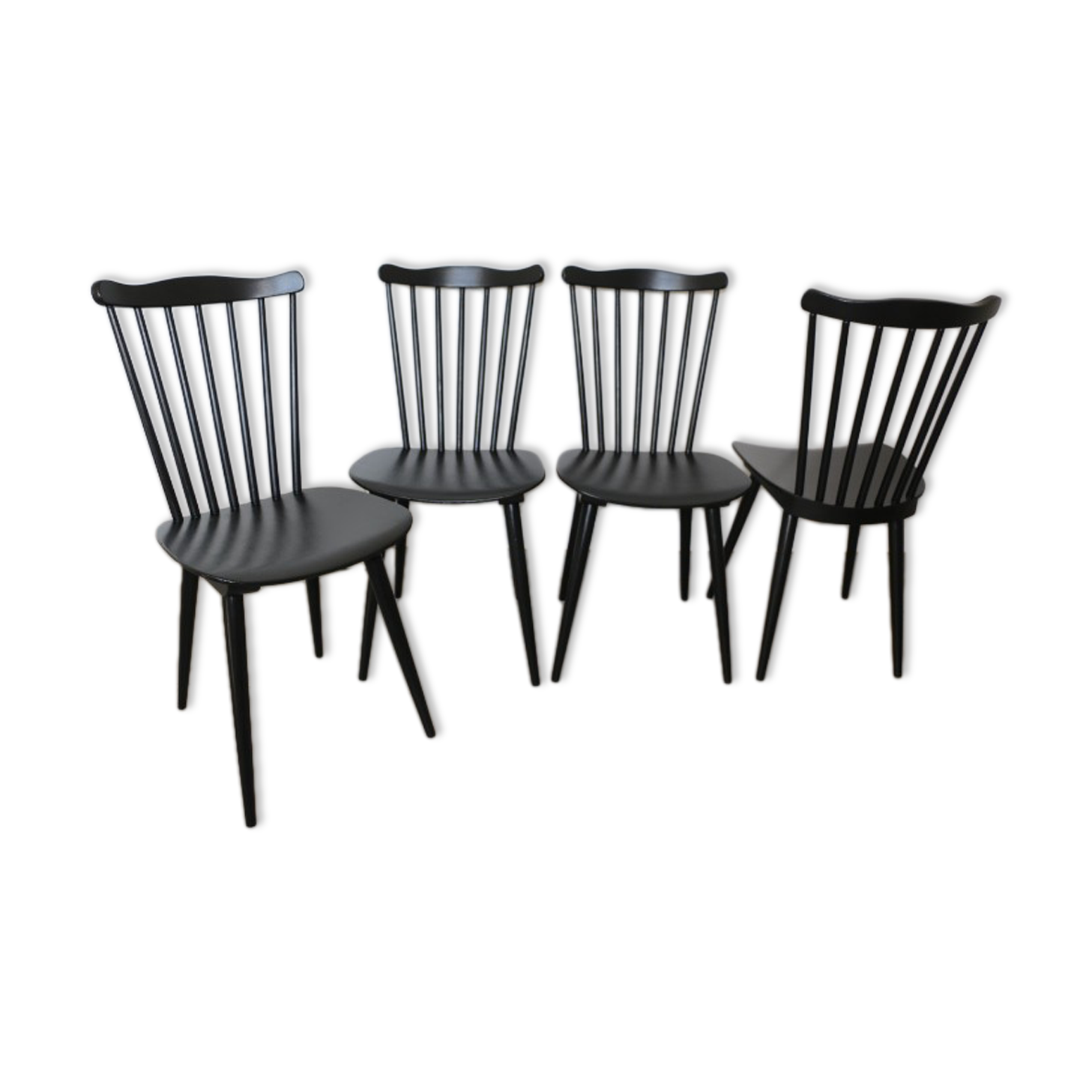 4 black Baumann V5 chairs