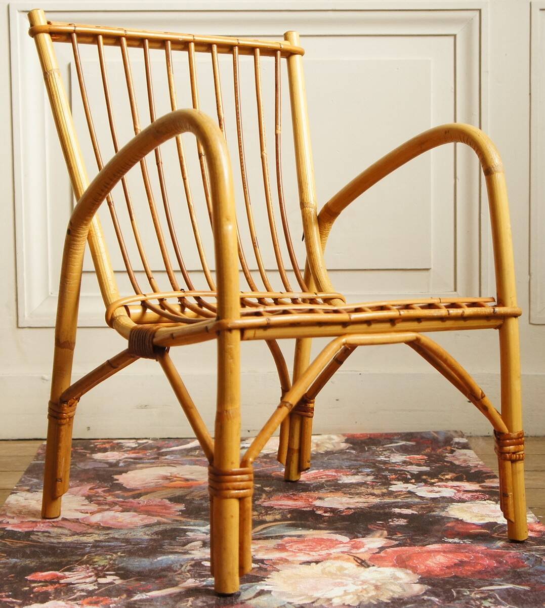Children's rattan armchair & its old pink skin