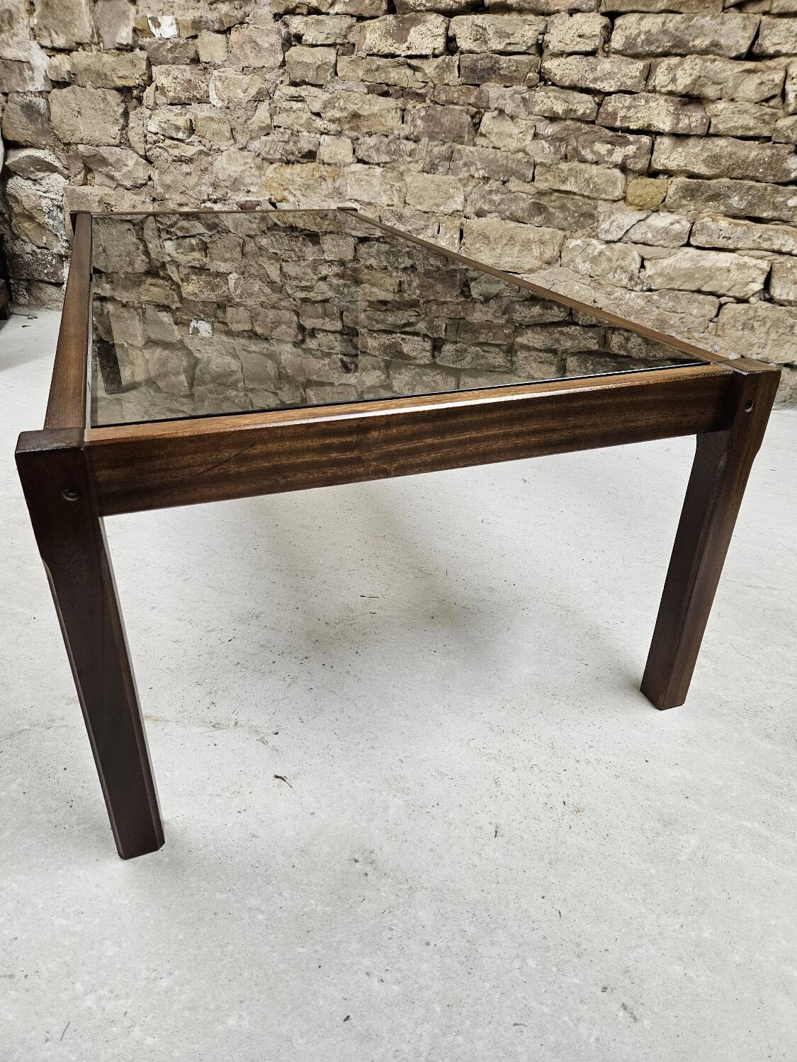 Teak coffee table with smoked glass 1970"