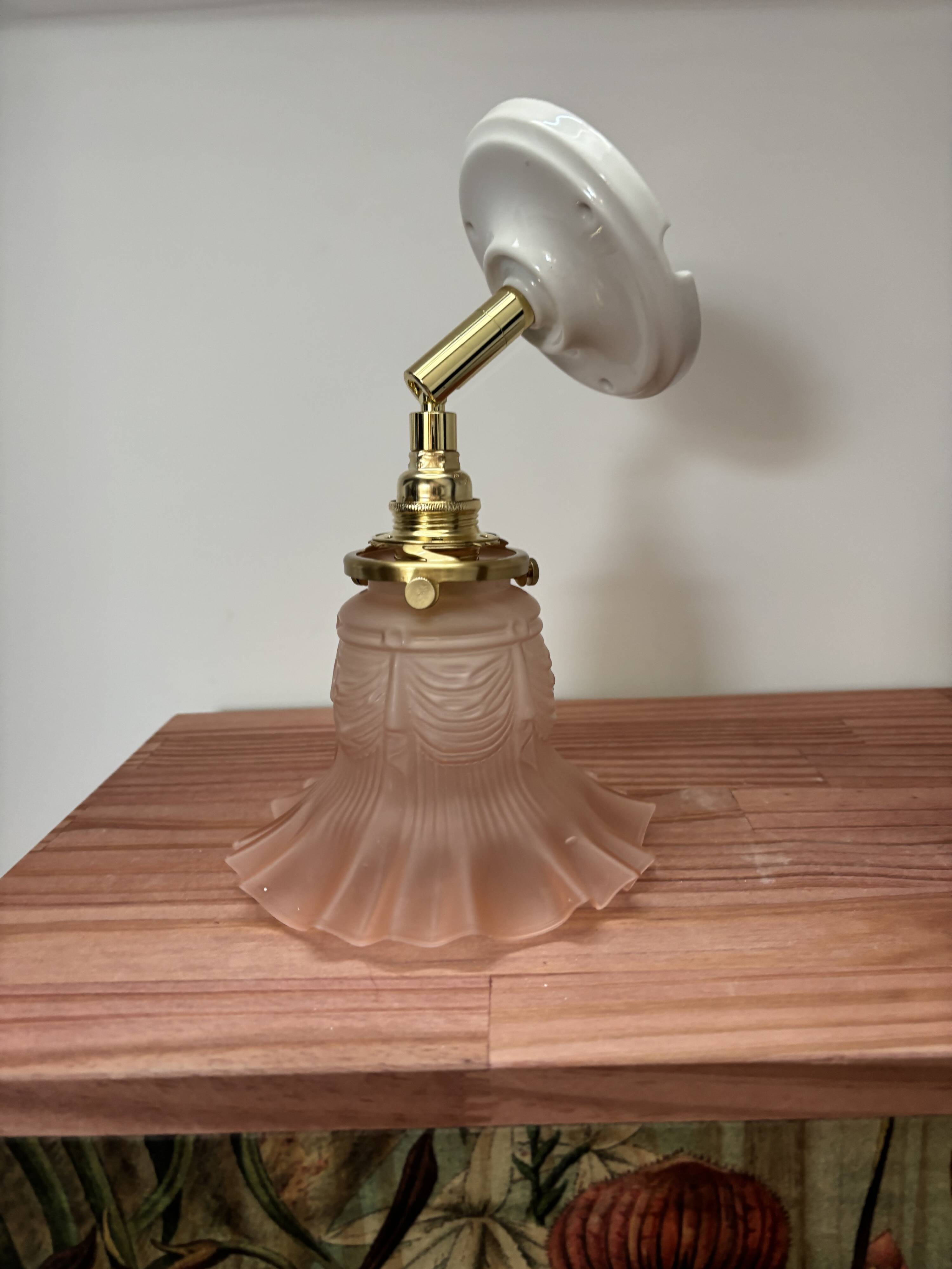 Gold and pink wall light