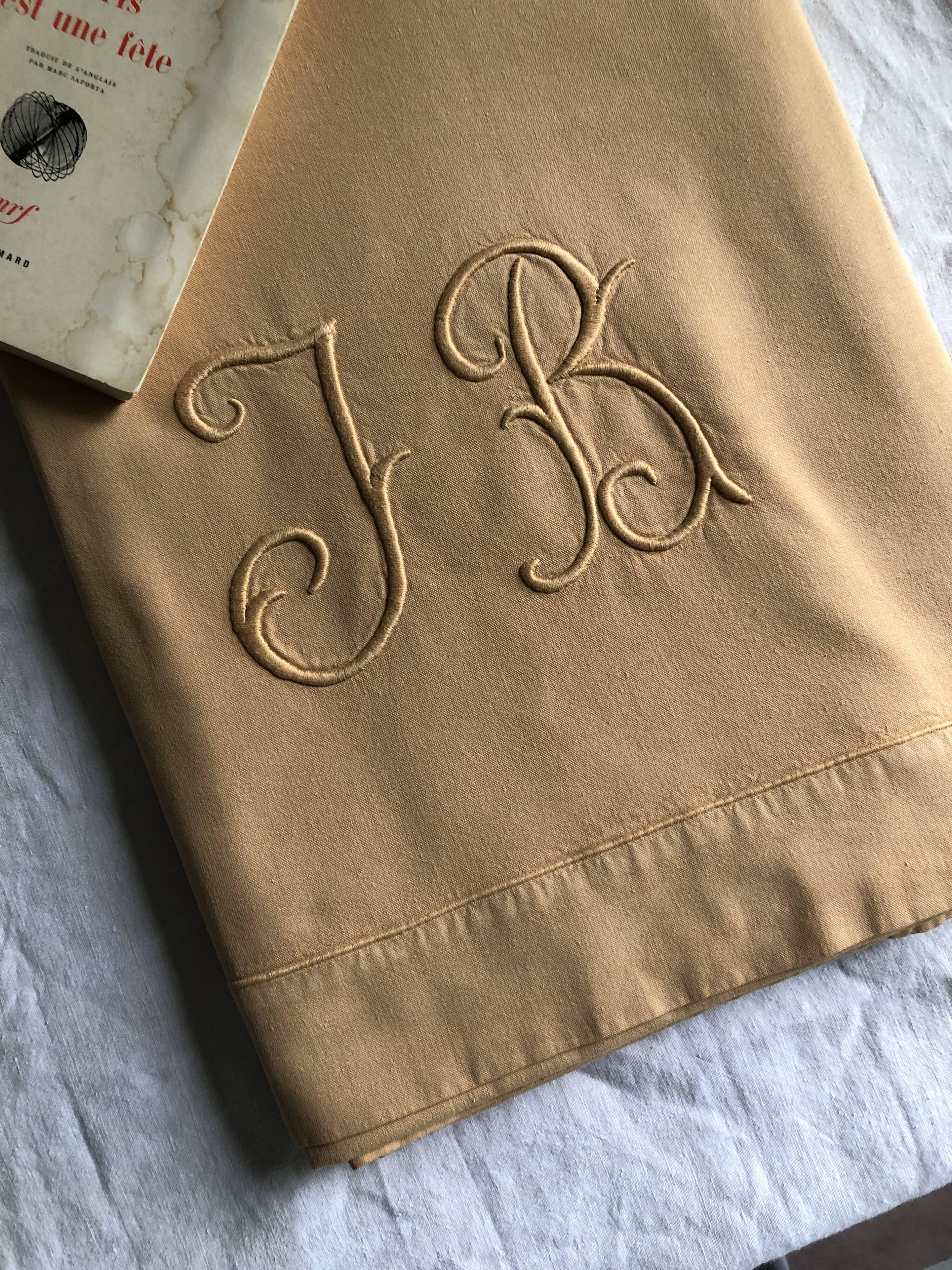 Old linen and yellow cotton sheet